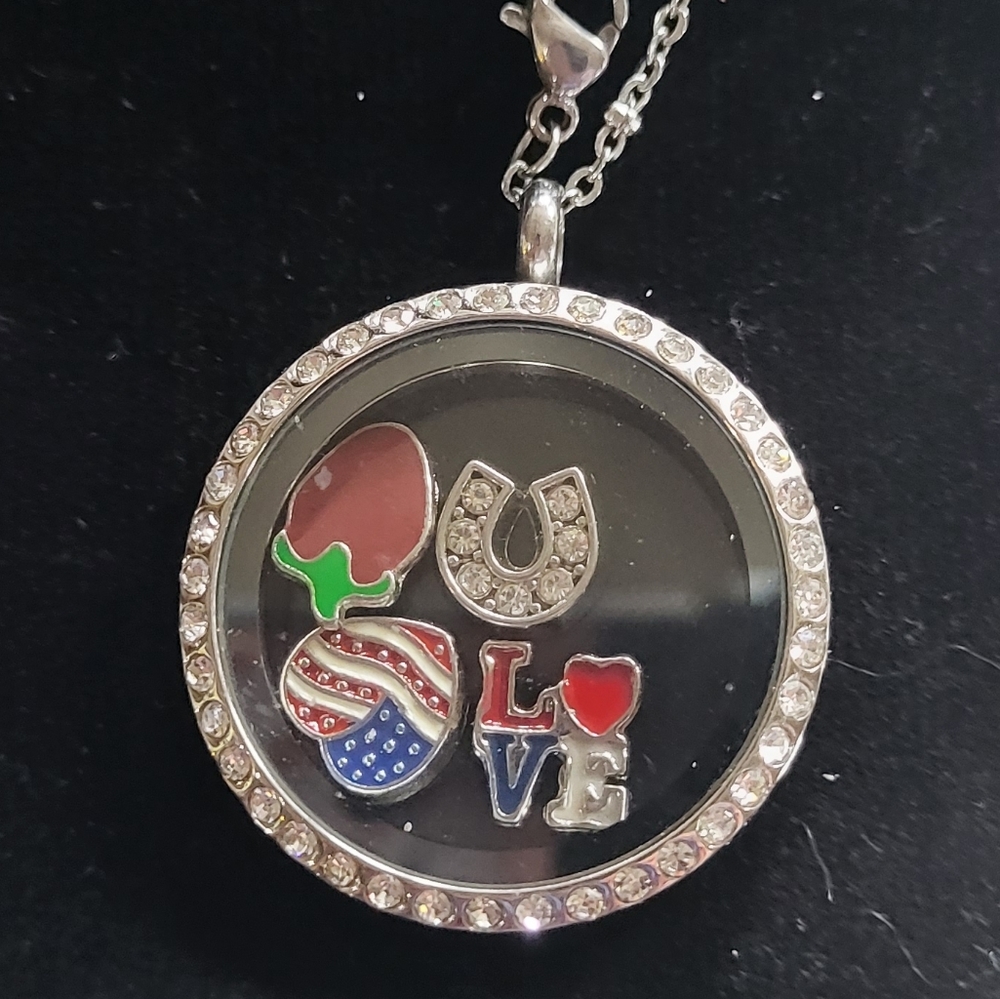 20 inch sterling silver charm necklace. Charms included